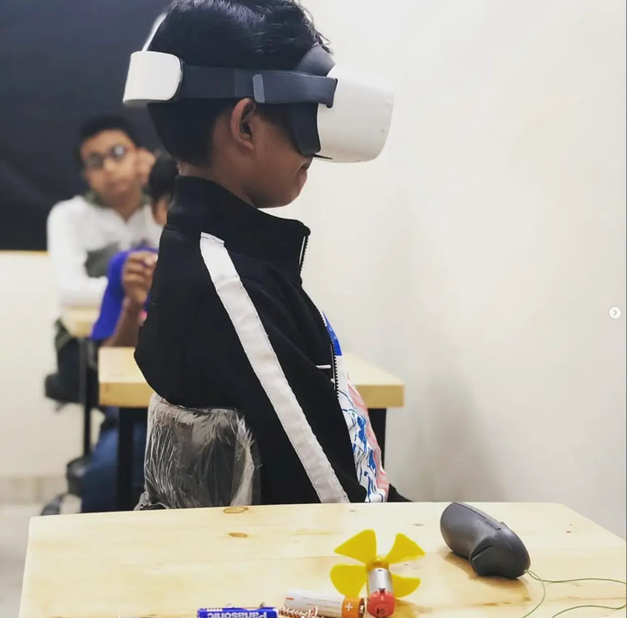 Student exploring a 3D model in VR
